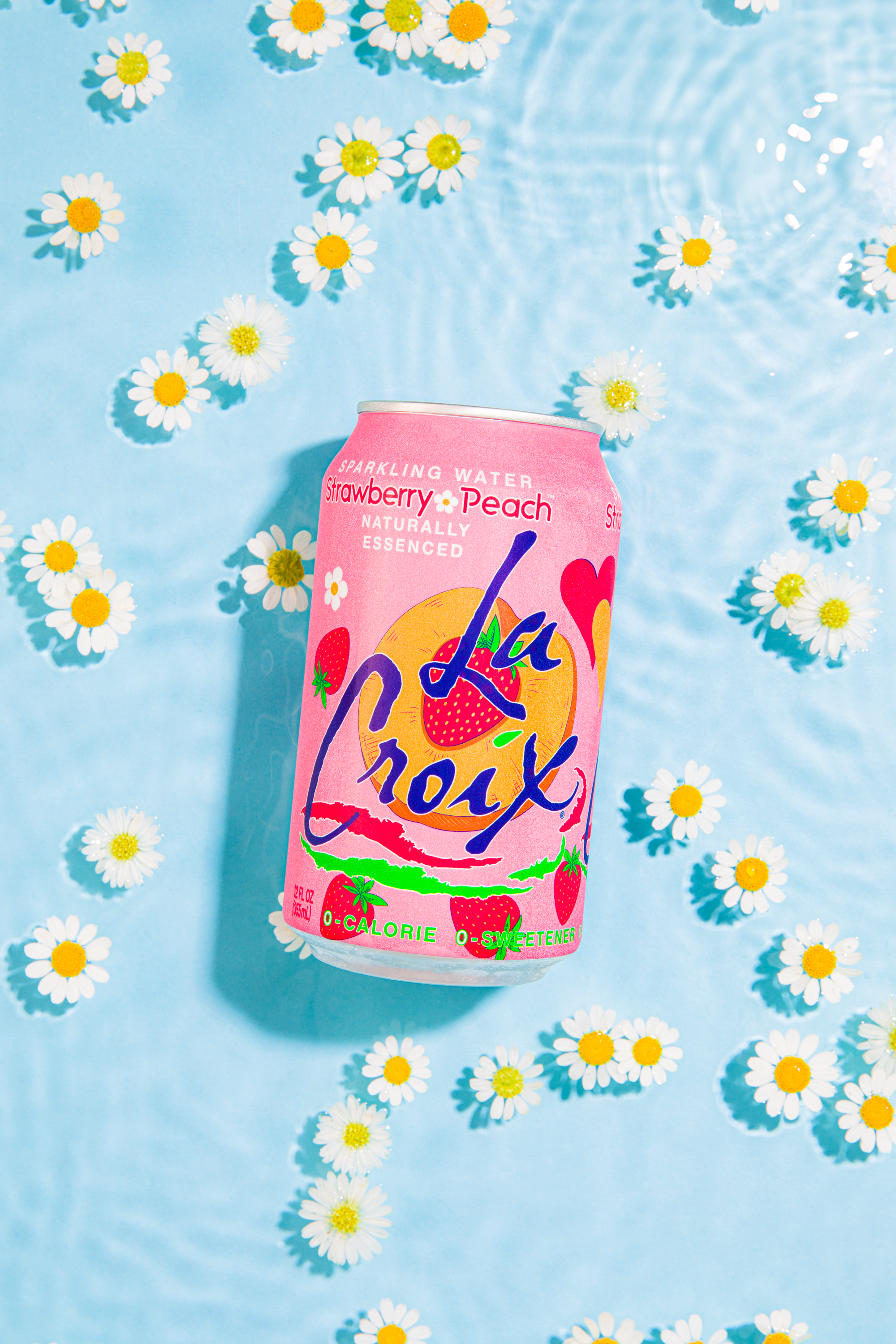 LaCroix Strawberry Peach floating flowers
