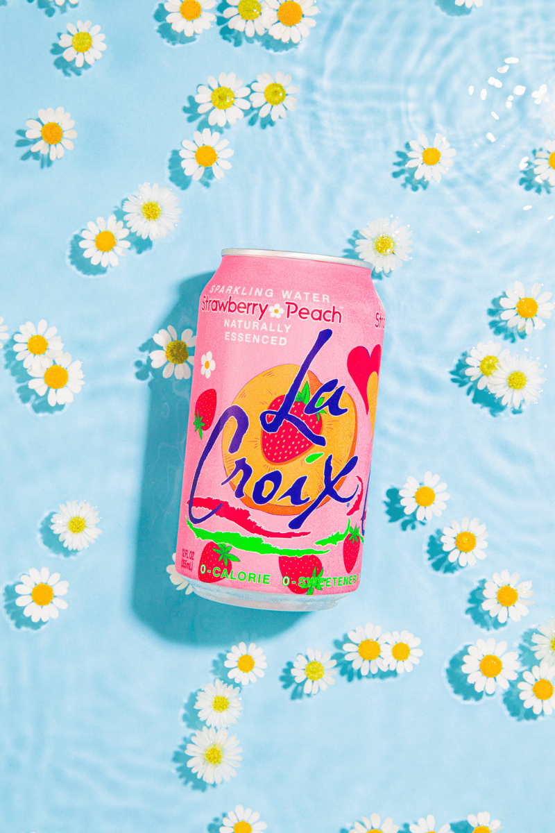 LaCroix Strawberry Peach floating flowers